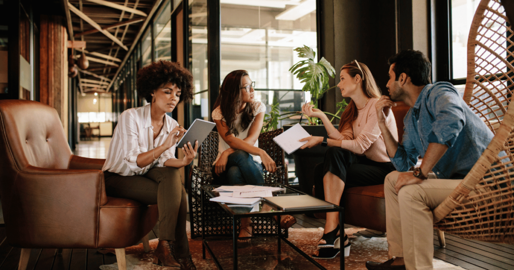 A team of four people having a meeting